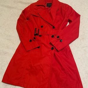 Red Banana Republic spring trench coat with belt.